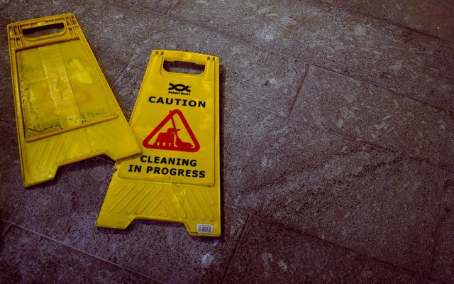 cleaning floors sign