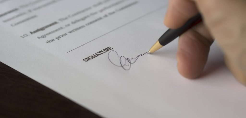 signing a warranty policy 
