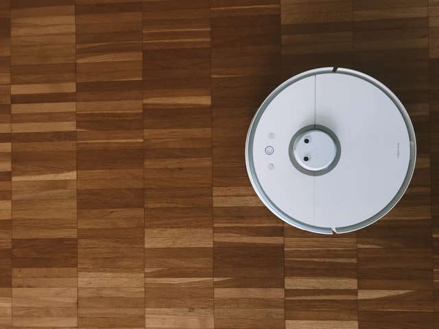 A Roomba, one of the top home cleaning gadgets